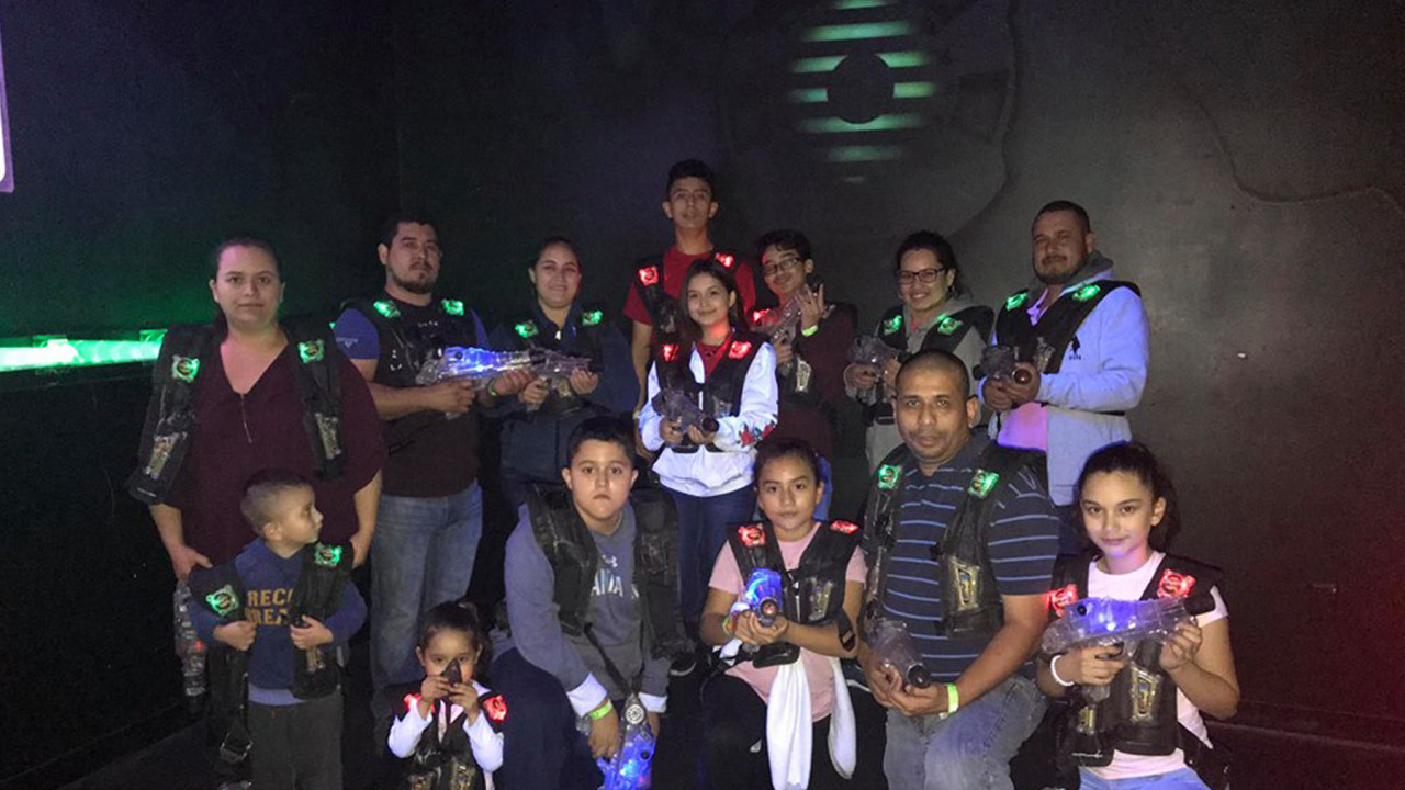 Group playing laser tag